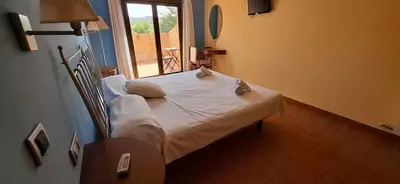 Cama o camas de una habitación en Hotel Villa de Estercuel