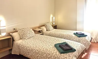 Cama o camas de una habitación en Rincón del Valle- Gavin