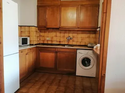 Una cocina o zona de cocina en Chimenea y espacio para todos, ideal para famílias - Isard 2