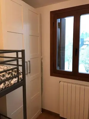 Cama o camas de una habitación en Apartamento la Abadía en Tramacastilla