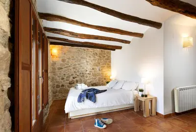 Cama o camas de una habitación en Chimenea y vistas espectaculares a los Puertos