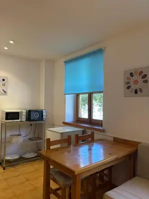 Una cocina o zona de cocina en Tu rincón rústico - Acogedor para parejas - Cuc 1