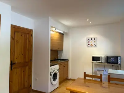 Una cocina o zona de cocina en Tu rincón rústico - Acogedor para parejas - Cuc 1