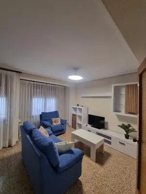 Una televisión o centro de entretenimiento en Amani Apartamento Alcañiz