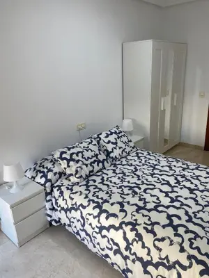 Cama o camas de una habitación en Apartamento Marisol