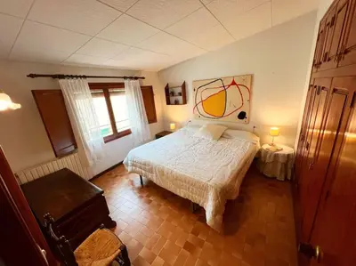 Cama o camas de una habitación en Casa Teto, ideal famílies i grups