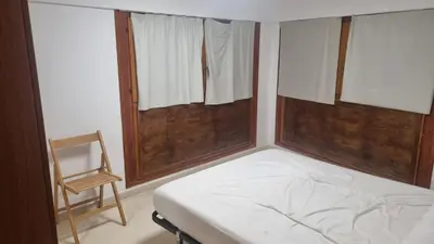 Cama o camas de una habitación en Apartamento Torre Gótica
