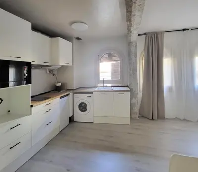 Una cocina o zona de cocina en Apartamentos Crispín Candela