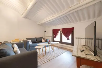 Una televisión o centro de entretenimiento en Casa Rural Encantadora