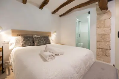 Cama o camas de una habitación en Casa Rural Encantadora