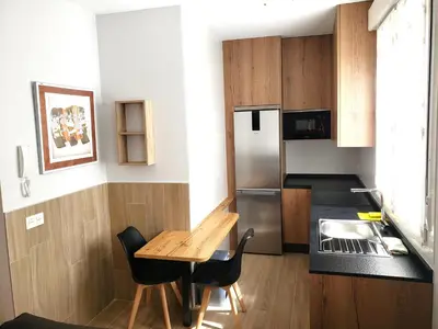 Una cocina o zona de cocina en Apartamentos Meson del Barro - Alojamientos Pamplona