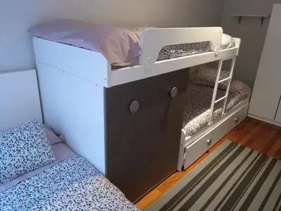 Cama o camas de una habitación en Vivienda Turística La Moleta