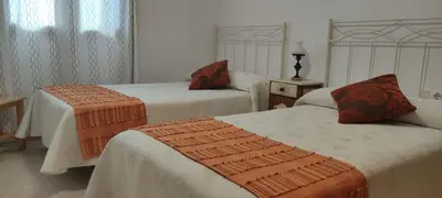 Cama o camas de una habitación en Apartamento EL RIO