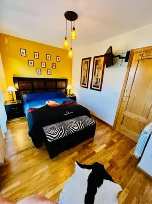 Cama o camas de una habitación en Adosado Las Cumbres de Hoz