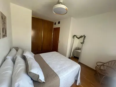Cama o camas de una habitación en Atico con vistas al Mercado Central Opcion de parking