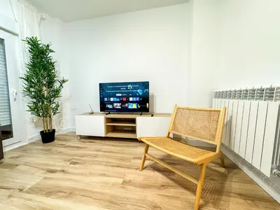 Una televisión o centro de entretenimiento en El Mastin del Pirineo Turistea