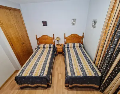 Cama o camas de una habitación en Pensión El Gallo
