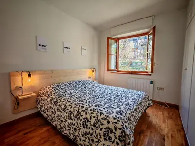 Cama o camas de una habitación en Chimenea y modernidad rústica- Confort ideal - Dellui 3