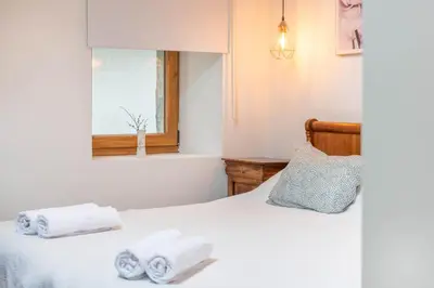 Cama o camas de una habitación en Casa karrikaburu, acogedores apartamentos rodeados de naturaleza