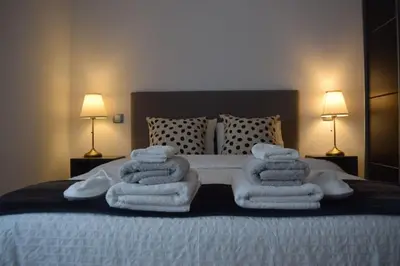 Cama o camas de una habitación en Inmejorable Apartamento cerca Estación Delicias con GARAJE