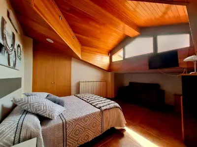 Cama o camas de una habitación en Casas Rurales Peña Flor 8