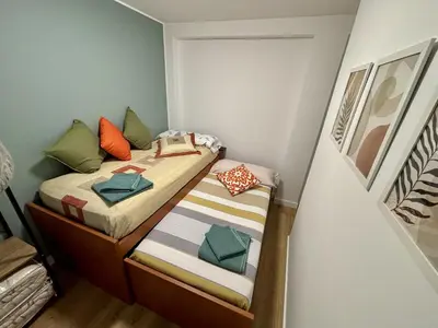 Cama o camas de una habitación en imak barrio del AVE