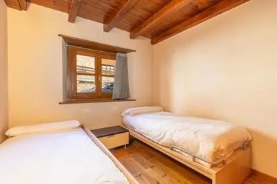 Cama o camas de una habitación en Gessa Baqueira