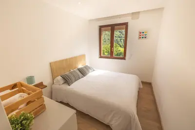 Cama o camas de una habitación en Casa Rural Urtasun