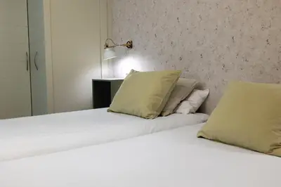 Cama o camas de una habitación en Balcón de Santo Domingo by Clabao