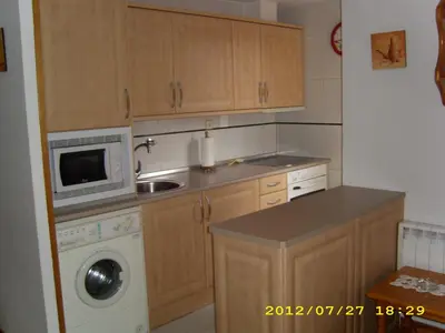 Una cocina o zona de cocina en FORMIGAL Edificio PORTALET II VUT-HU-25-0303