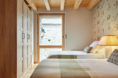 Cama o camas de una habitación en Era Artiga by FeelFree Rentals