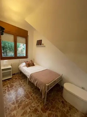 Cama o camas de una habitación en La Tofonera, alojamiento rural