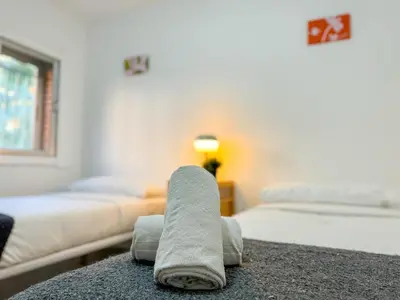 Cama o camas de una habitación en Madrina del Pilar - Turistea