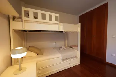 Cama o camas de una habitación en Apartament Vega - Vall Fosca - L'Amfitriona