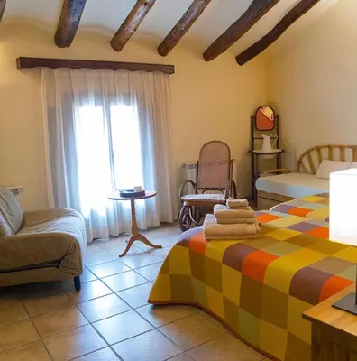 Cama o camas de una habitación en La Posada de Berge
