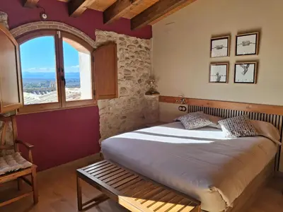 Cama o camas de una habitación en Ca la Pubilla