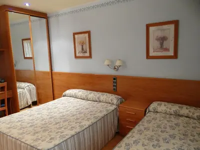 Cama o camas de una habitación en Hotel Casa Carmen