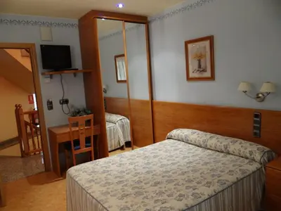 Cama o camas de una habitación en Hotel Casa Carmen