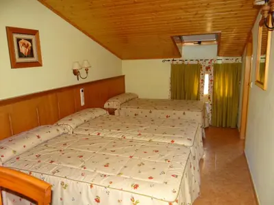 Cama o camas de una habitación en Hotel Casa Carmen