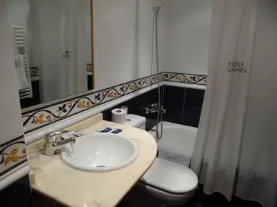 Un baño de Hotel Casa Carmen