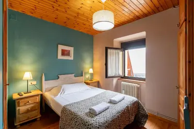 Cama o camas de una habitación en Petit Verneda