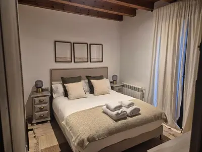 Cama o camas de una habitación en Chalet con encanto Jardín y Parking Privado