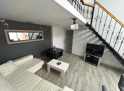 Una televisión o centro de entretenimiento en Loft Olite