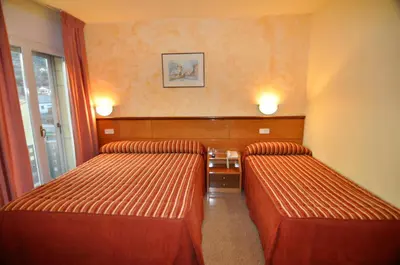 Cama o camas de una habitación en Hotel Solé