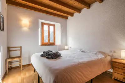Cama o camas de una habitación en Casa Unhòla by SeaMount Rentals
