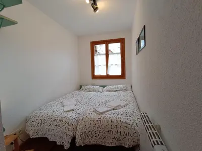 Cama o camas de una habitación en InmoCyma Pico Sayó Benasque
