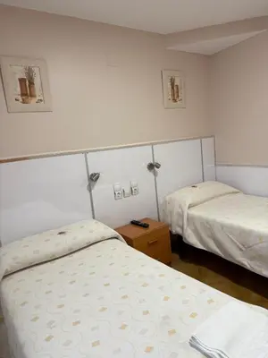 Cama o camas de una habitación en Pensión Discoves