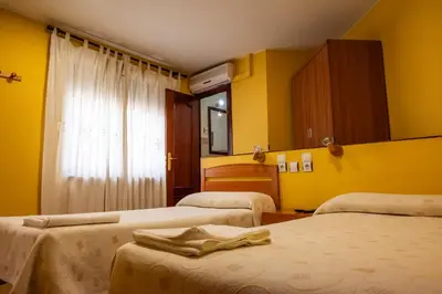 Cama o camas de una habitación en Pensión Discoves
