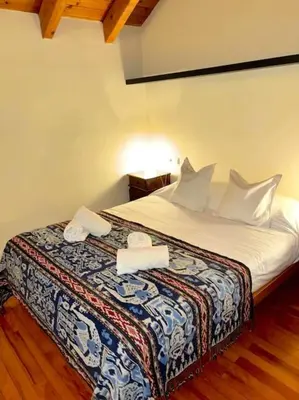 Cama o camas de una habitación en Dúplex de muntanya amb vistes by RURAL D'ÀNEU