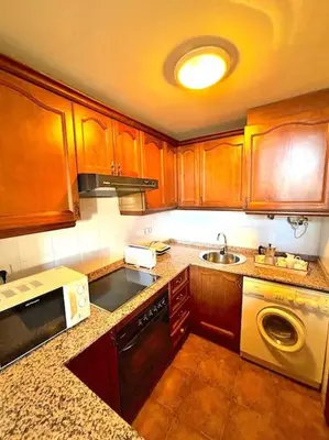 Una cocina o zona de cocina en Dúplex de muntanya amb vistes by RURAL D'ÀNEU